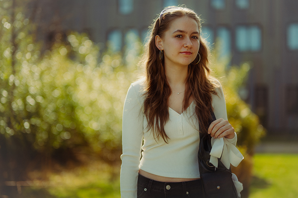 university of opportunity scholar stood on campus